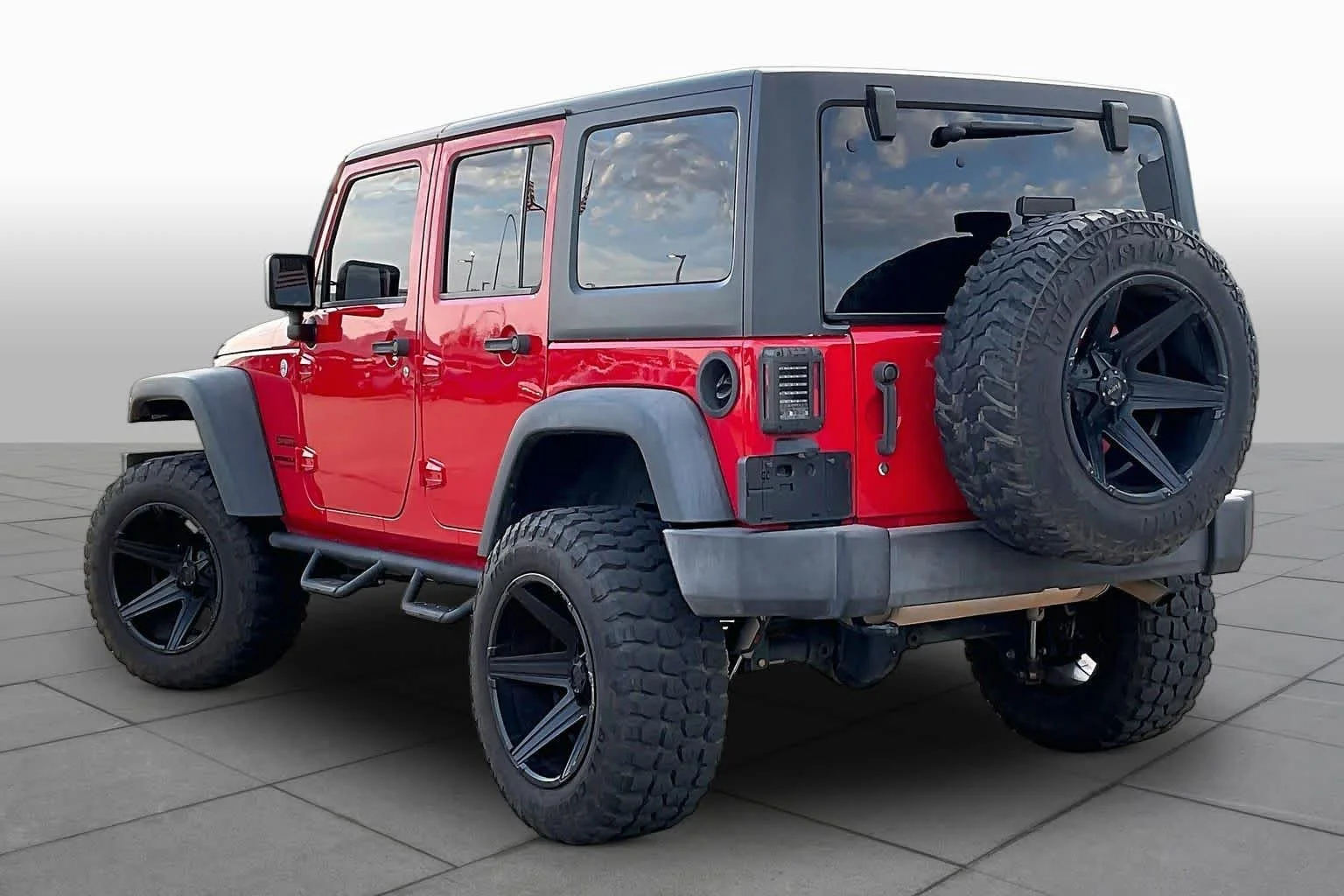 Used 2015 Firecracker Red Clear Coat Jeep Sport image 11