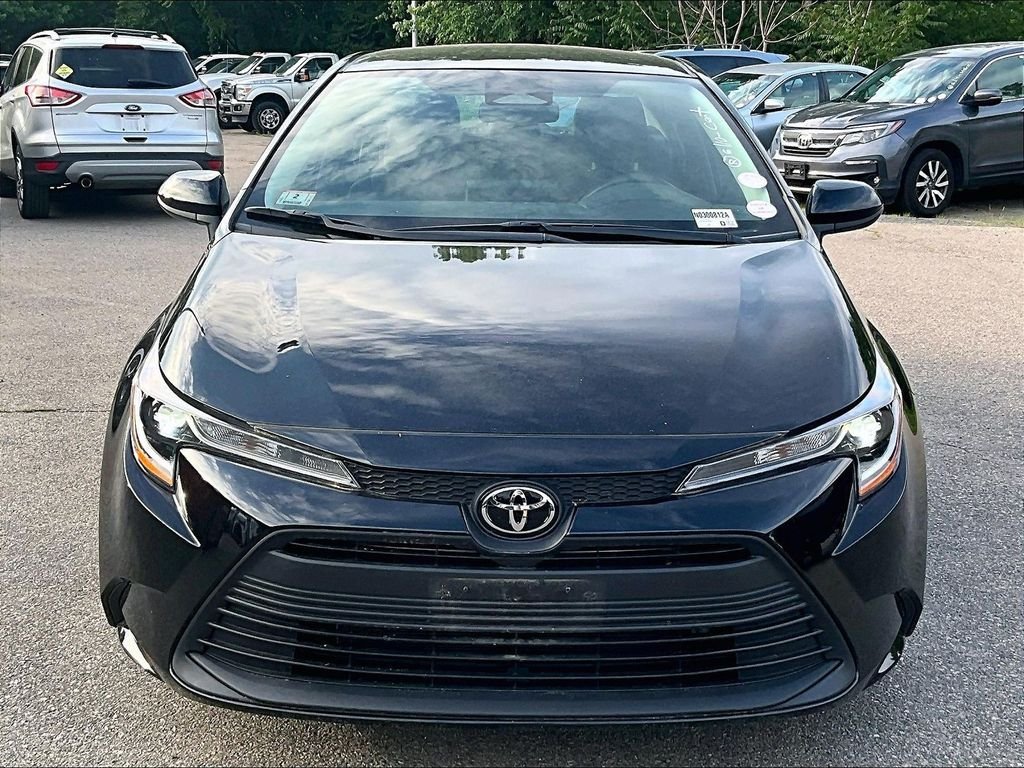 Used 2024 Black Toyota LE image 2