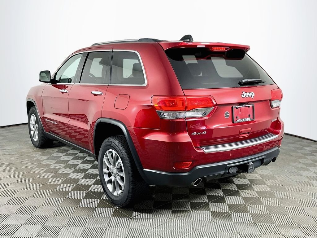 Used 2015 Deep Cherry Red Crystal Jeep Limited image 7