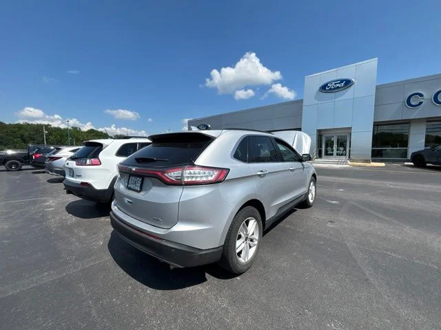 Used 2015 Gray Ford SEL image 1