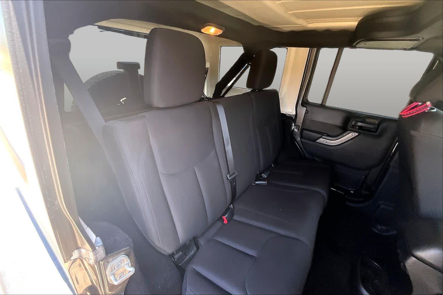 Used 2018 Granite Crystal Metallic Clearcoat Jeep Sport S image 18