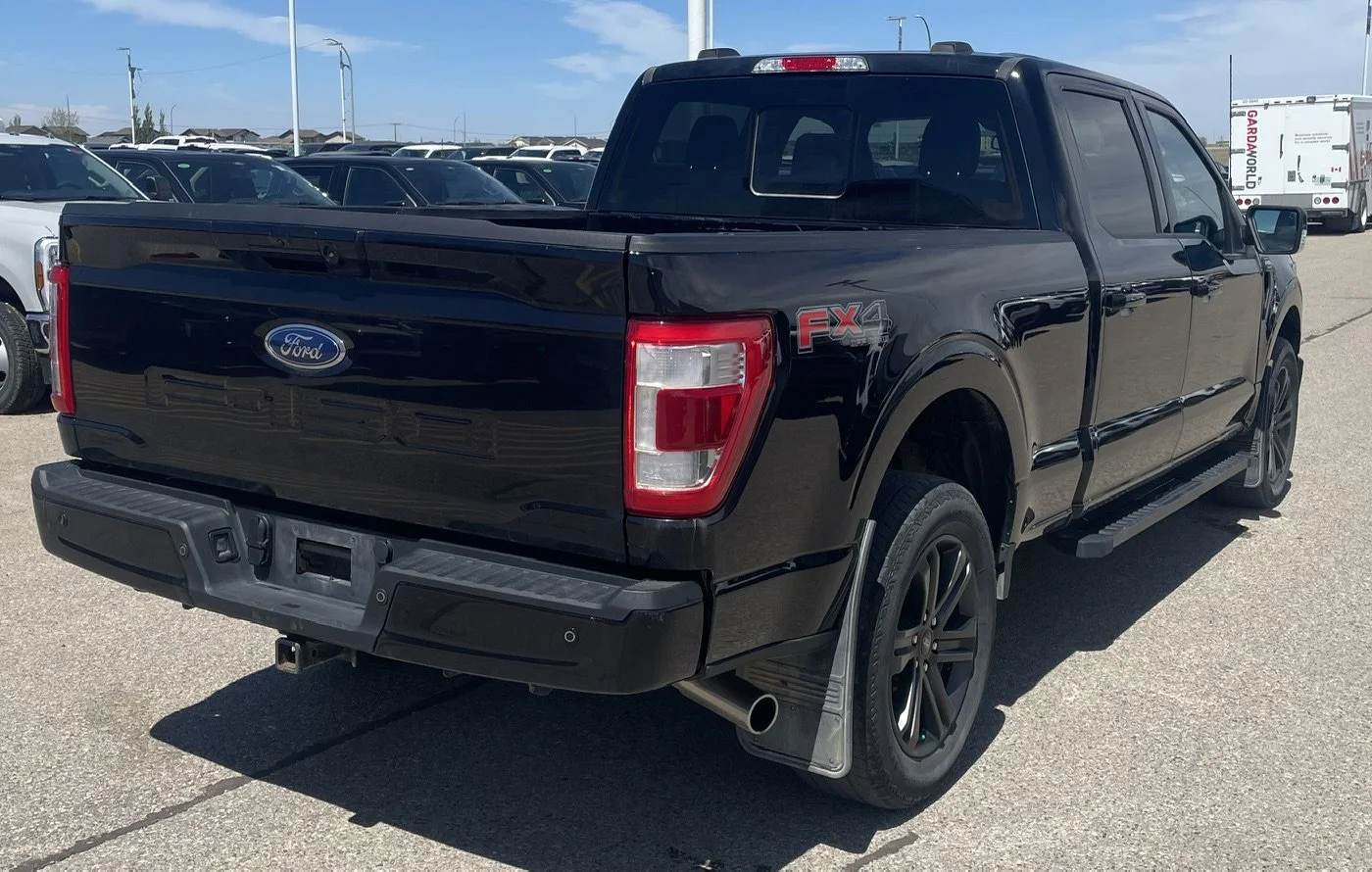 Used 2022 Black Ford LARIAT SuperCrew image 5