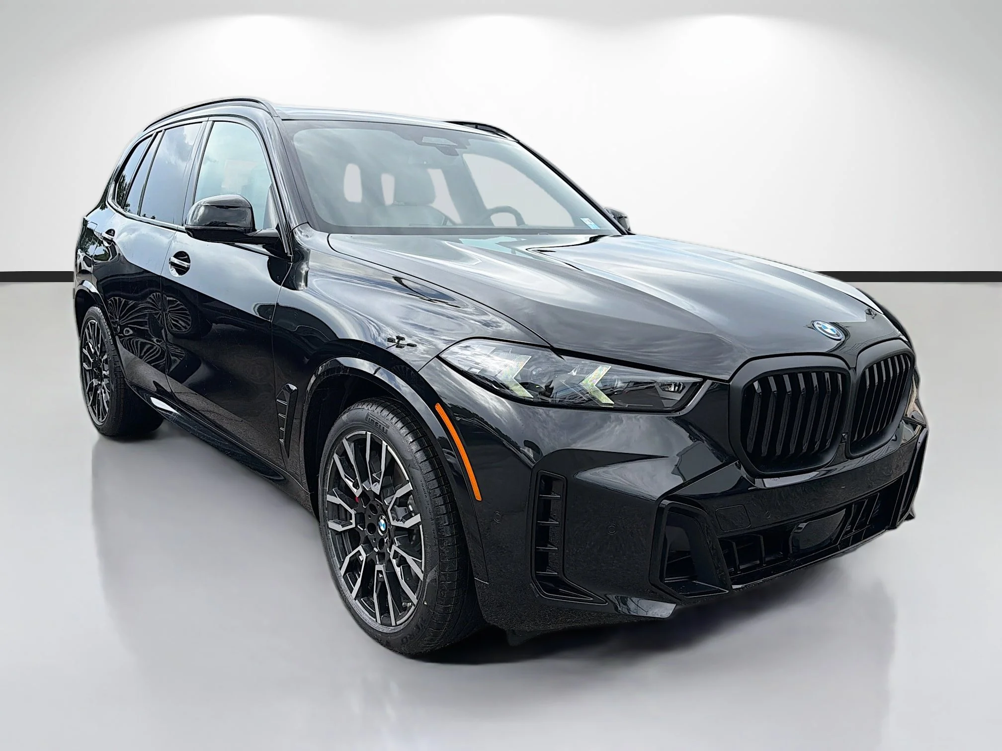 New 2026 Black Sapphire Metallic BMW xDrive50e image 1