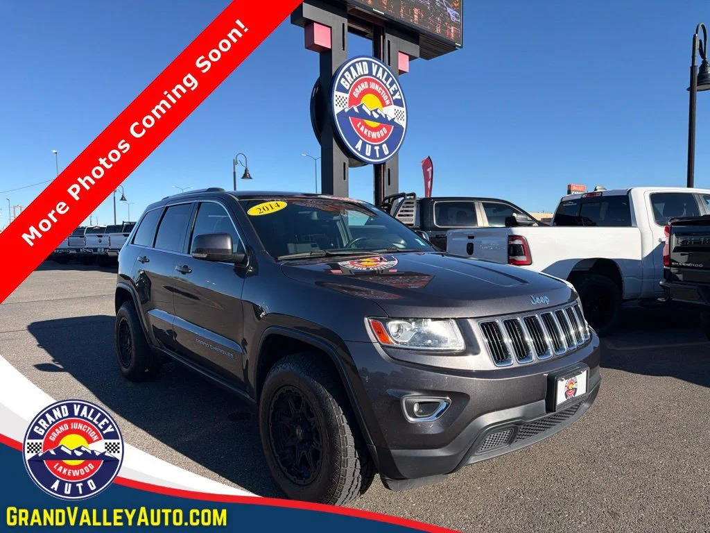 Used 2014 Gray Jeep Laredo image 1