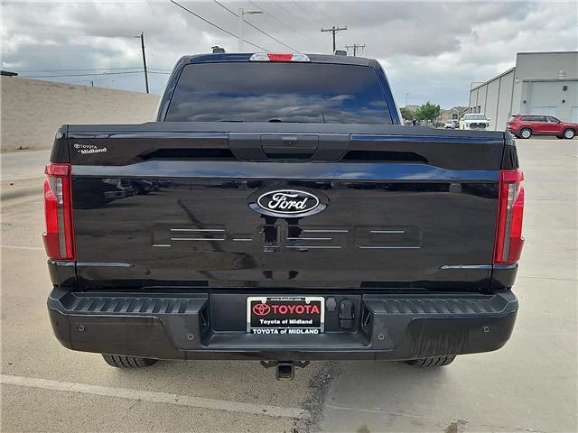 Used 2024 Agate Black Metallic Ford STX 4x4 SuperCrew Cab 5.5 ft. box 145 in. WB image 3