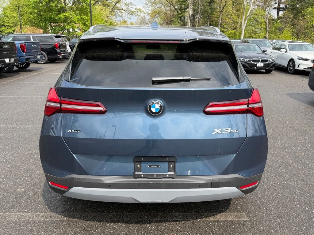 New 2026 Arctic Race Blue metallic BMW 30 xDrive image 4