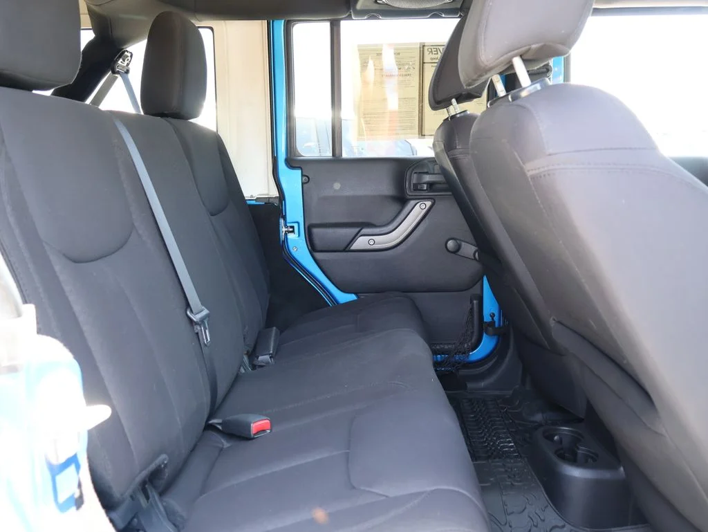 Used 2014 Blue Jeep Unlimited Sport image 11