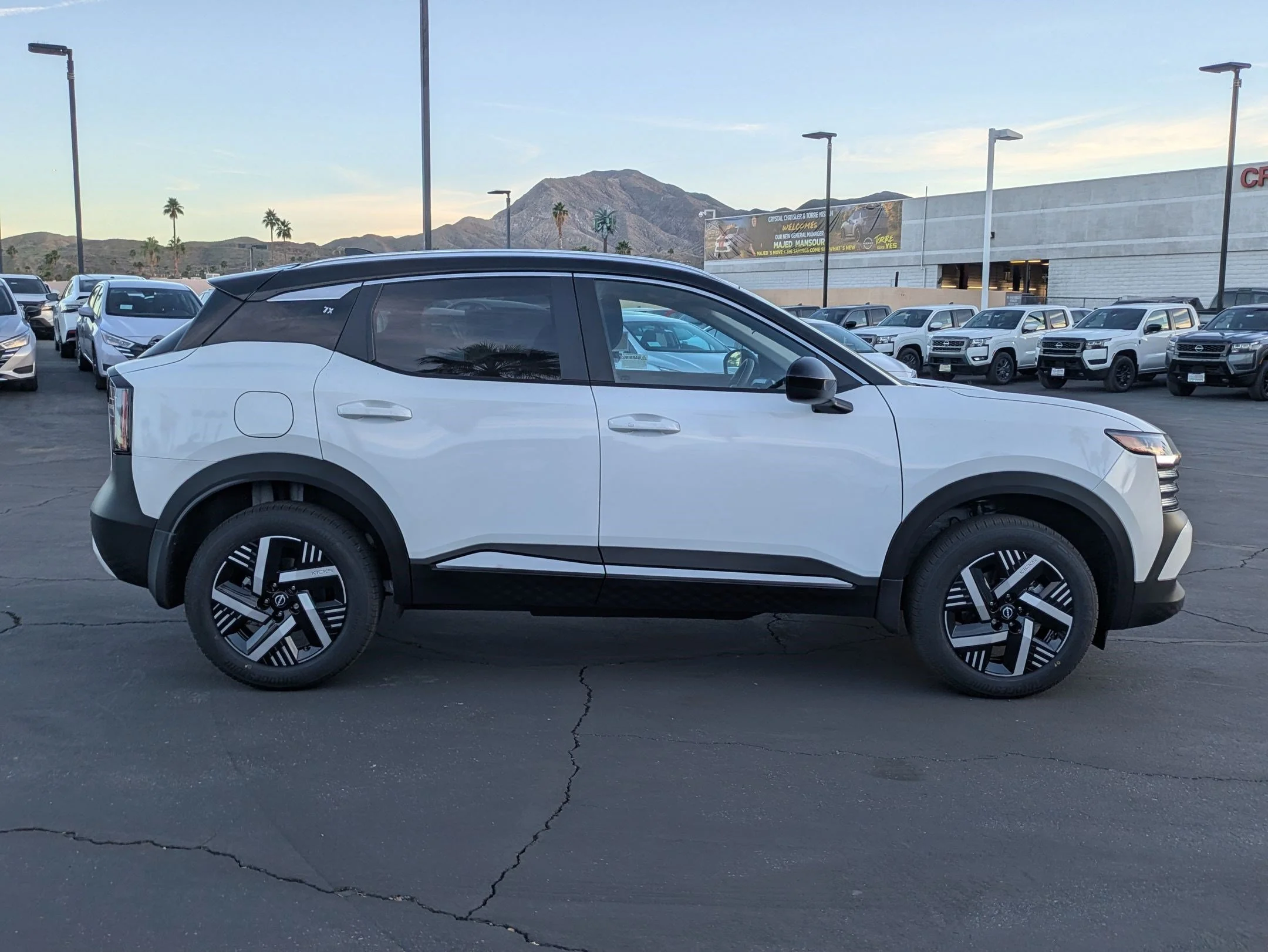 New 2026 Aspen White Tricoat/Super Black Nissan SV image 5