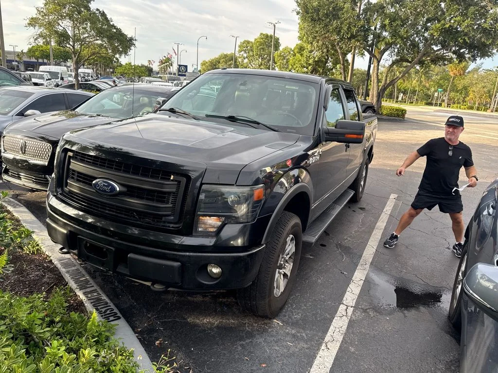 Used 2013 Black Ford FX4 image 1