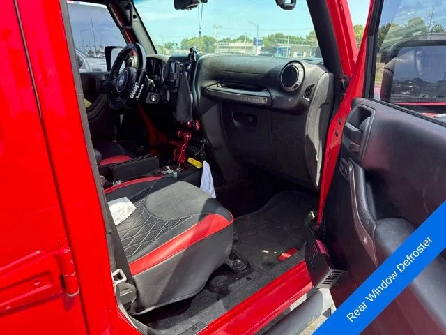 Used 2015 Firecracker Red Jeep Unlimited Sport image 6