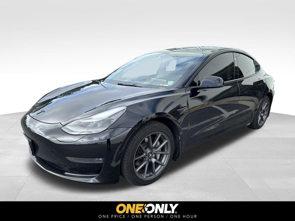 Used 2022 Solid Black Tesla Long Range image 1