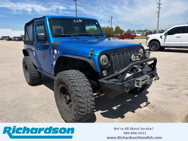 Used 2016 Blue Jeep Sport image 1