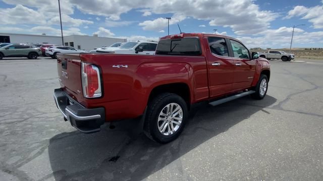 Used 2016 COPPER RED METALLIC GMC 4WD SLT image 8