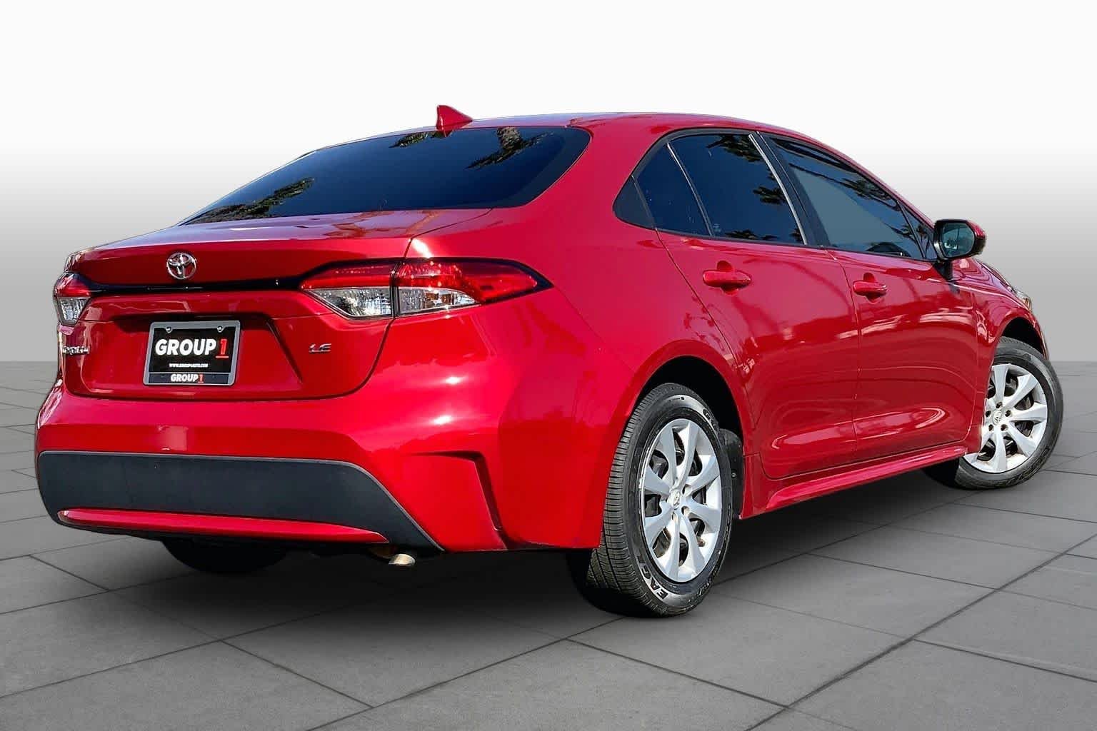 Used 2021 Barcelona Red Metallic Toyota LE image 12