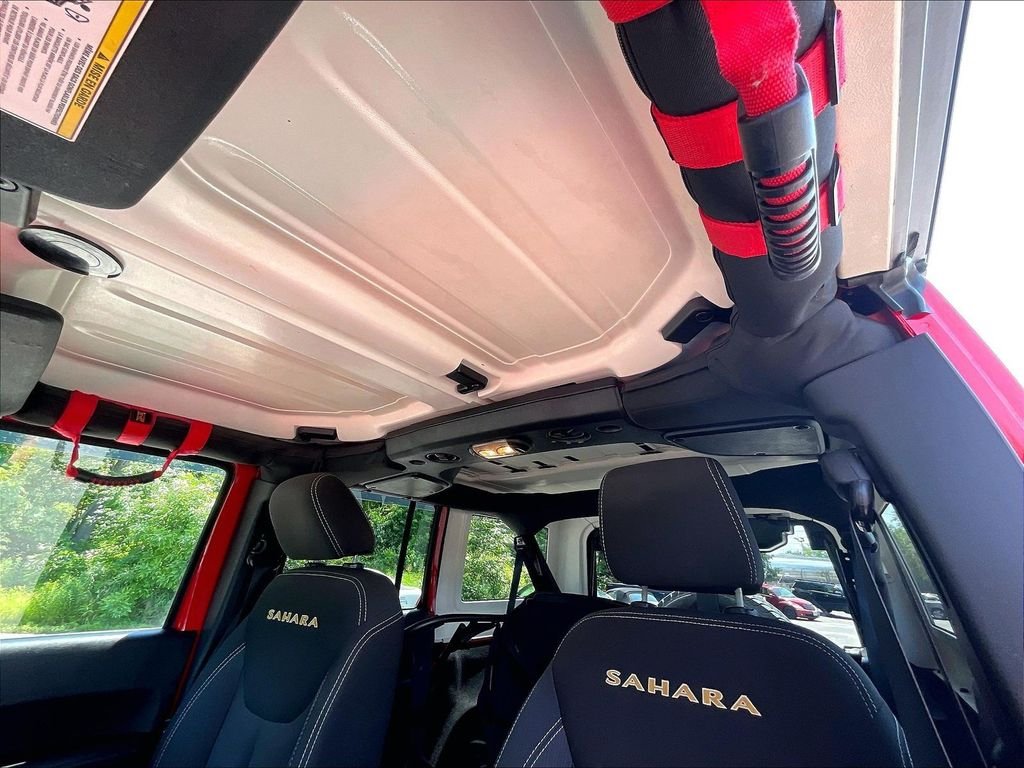 Used 2015 Red Jeep Unlimited Sahara image 7