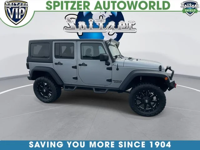 Used 2015 Silver Jeep Unlimited Sport image 10