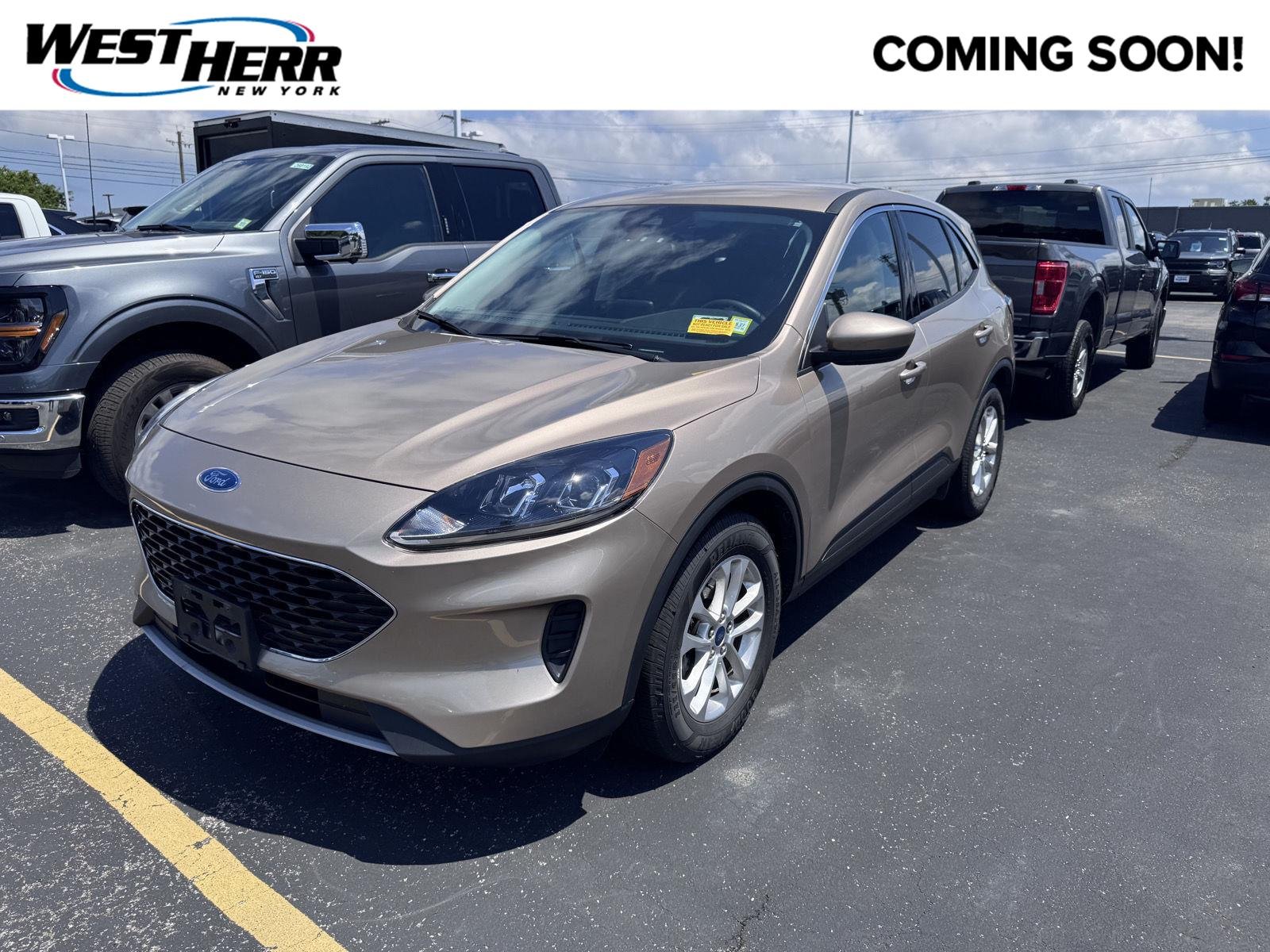 Used 2021 Desert Gold Ford SE image 1