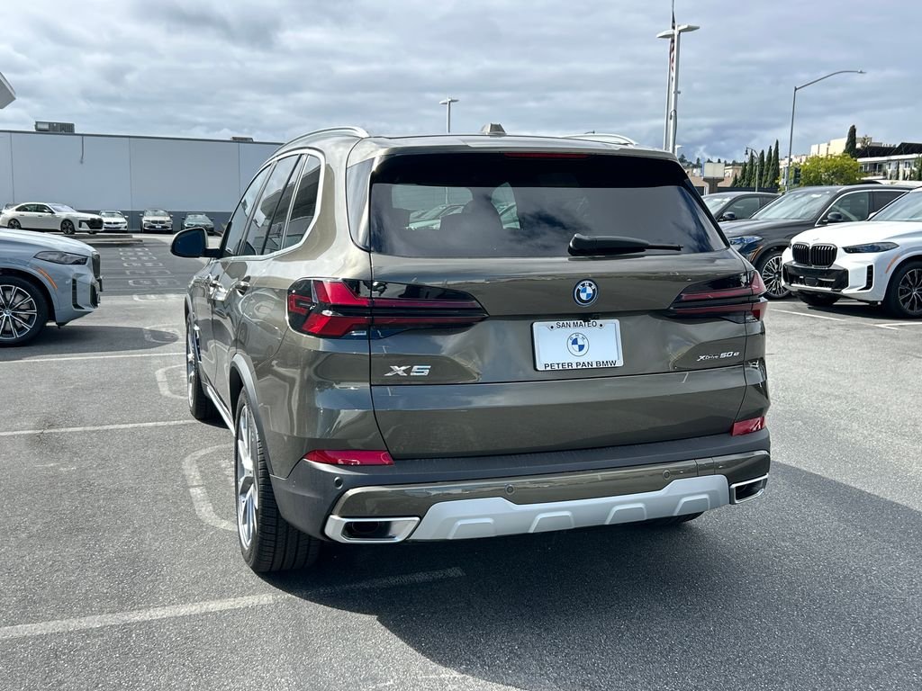 New 2026 Manhattan Green Metallic BMW xDrive50e image 3
