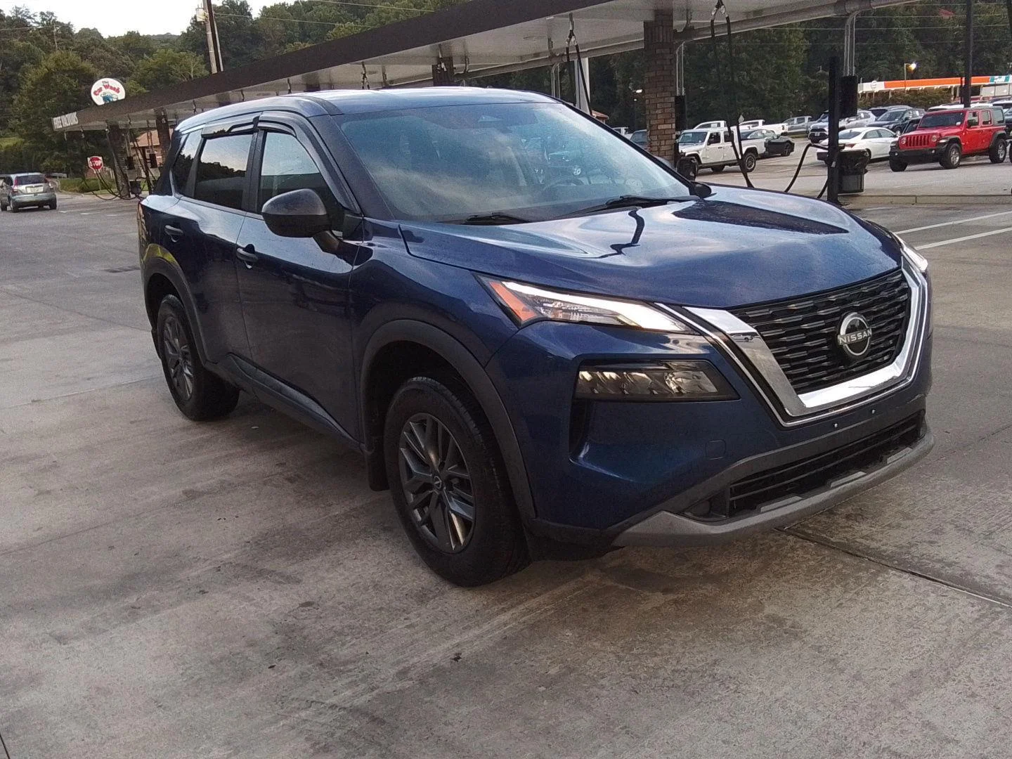 Used 2023 Caspian Blue Metallic Nissan S image 1