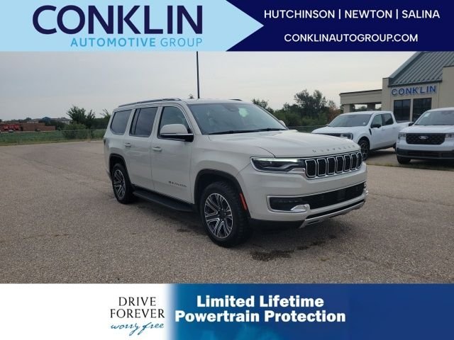 Used 2022 White Pearl Jeep Series III image 1