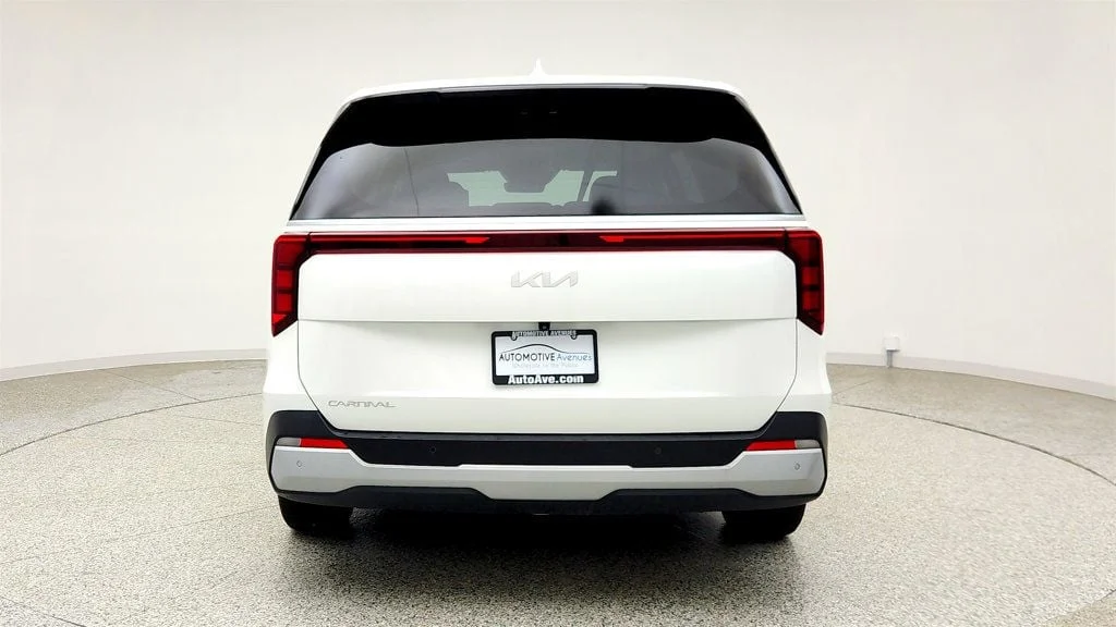 Used 2025 Snow White Pearl Kia LXS FWD image 6