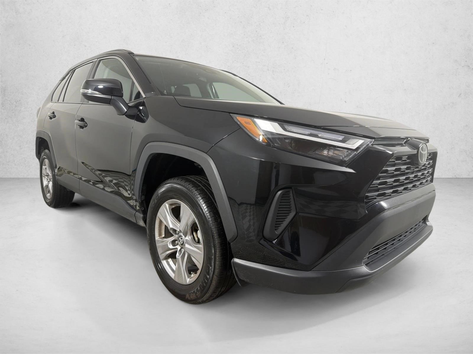 Used 2025 Midnight Black Metallic Toyota XLE image 1