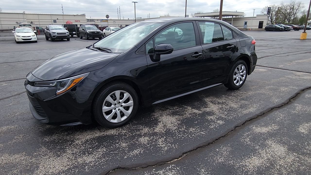 Used 2024 Midnight Black Metallic Toyota LE image 4