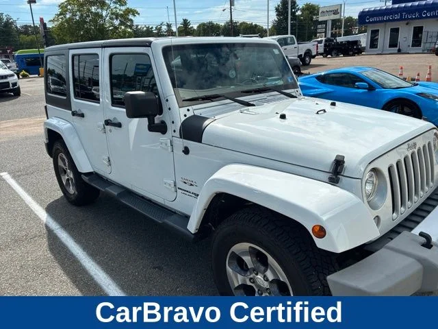 Used 2018 White Jeep Unlimited Sahara image 1