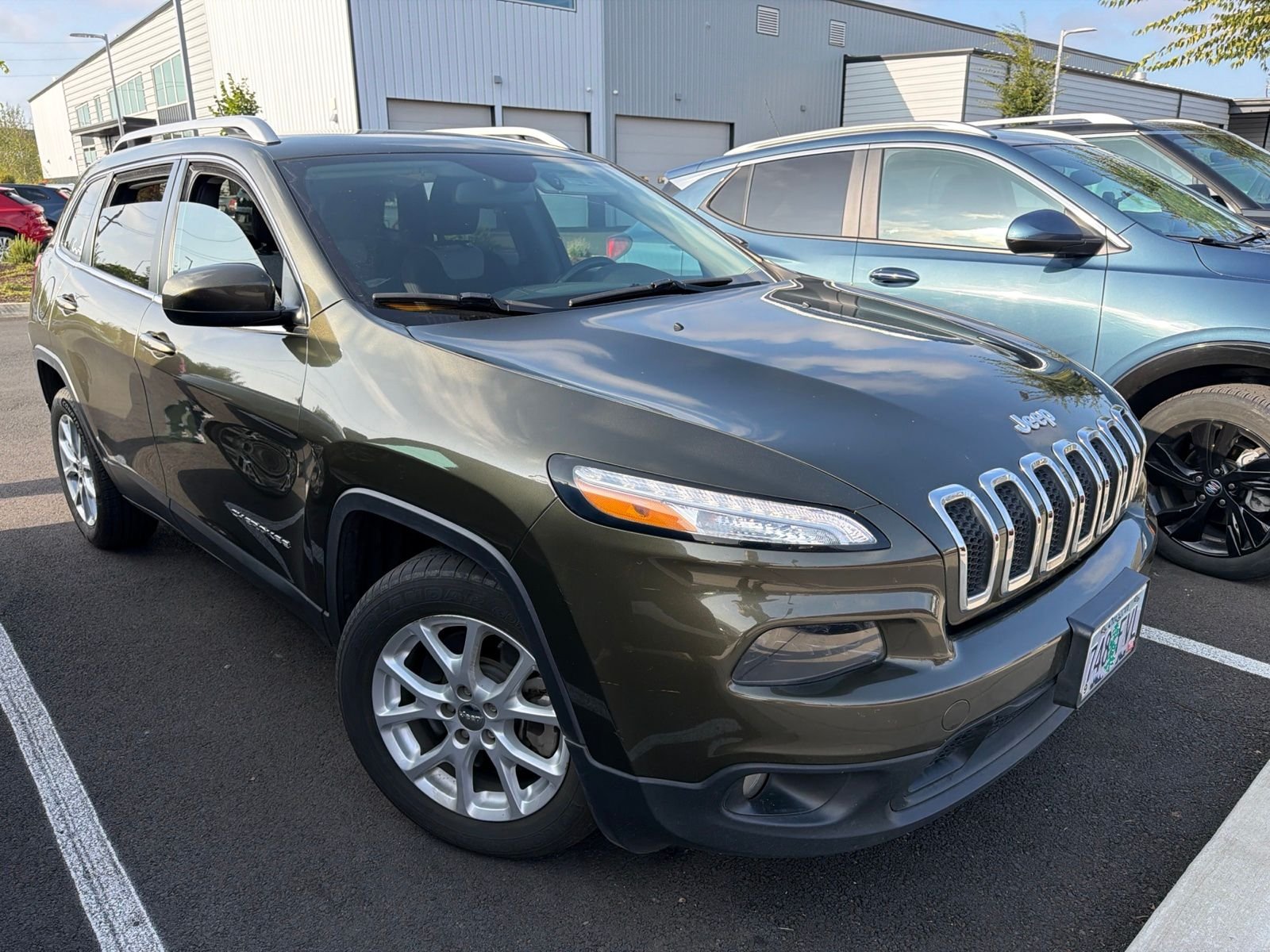 Used 2014 Green Jeep Latitude image 1