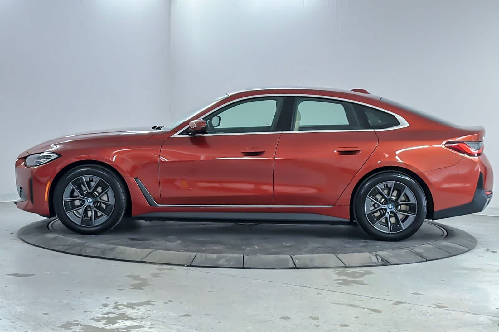 Used 2024 Sunset Orange Metallic BMW eDrive40 image 5