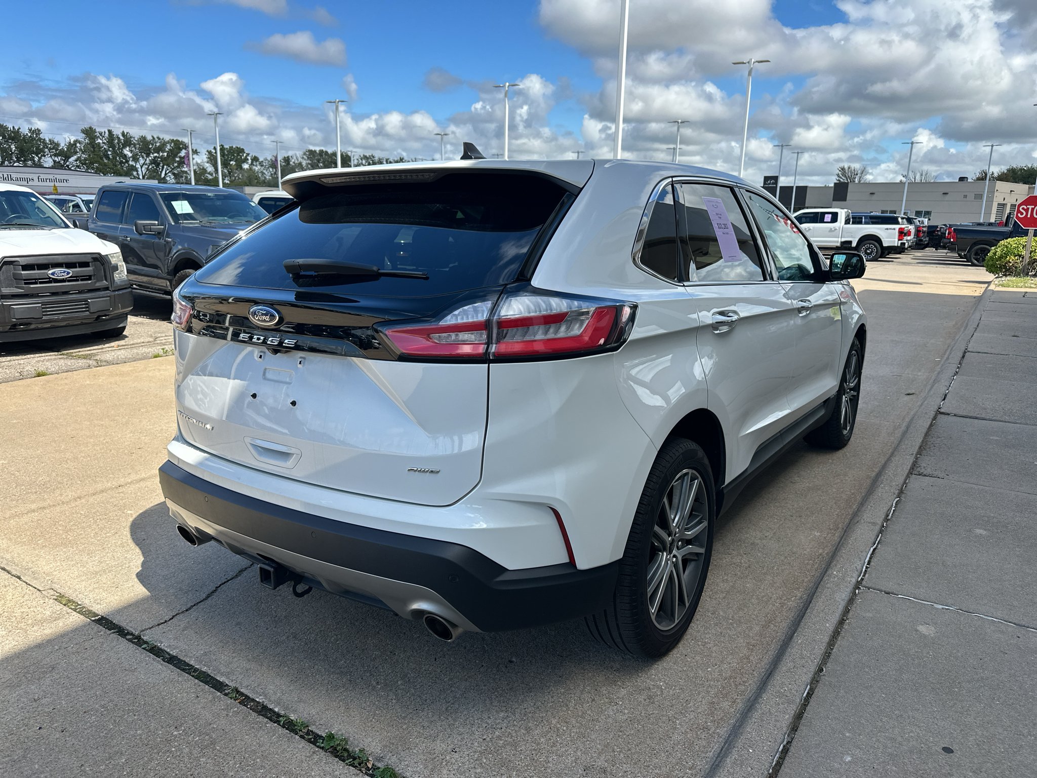 Used 2024 Star White Metallic Tri-Coat Ford Titanium image 10