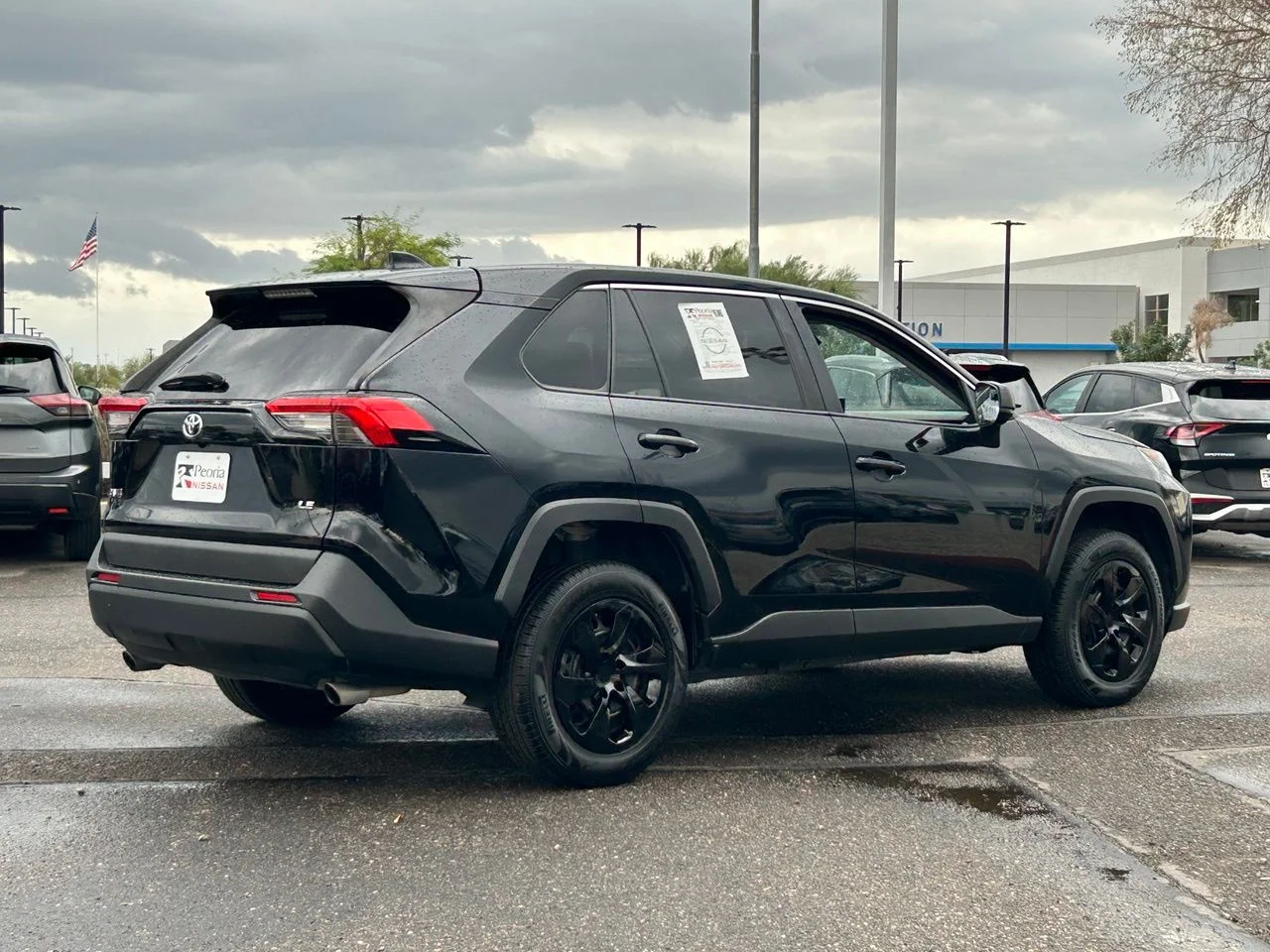 Used 2022 Midnight Black Metallic Toyota LE image 5