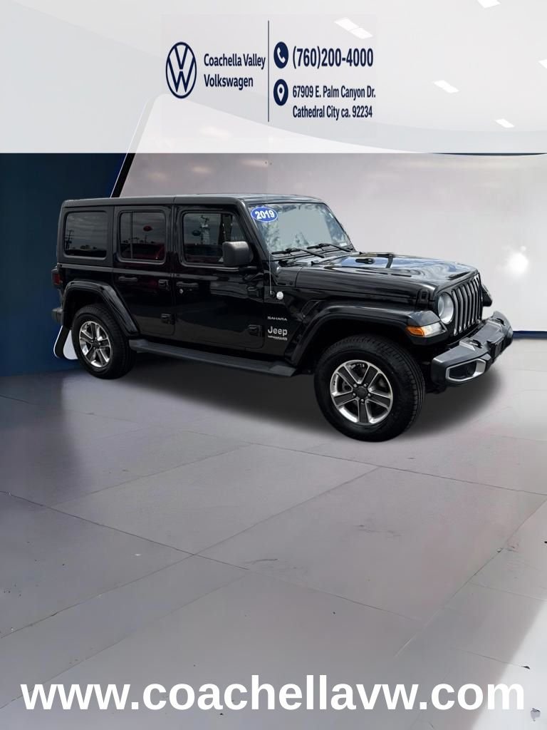 Used 2019 Black Jeep Unlimited Sahara image 1