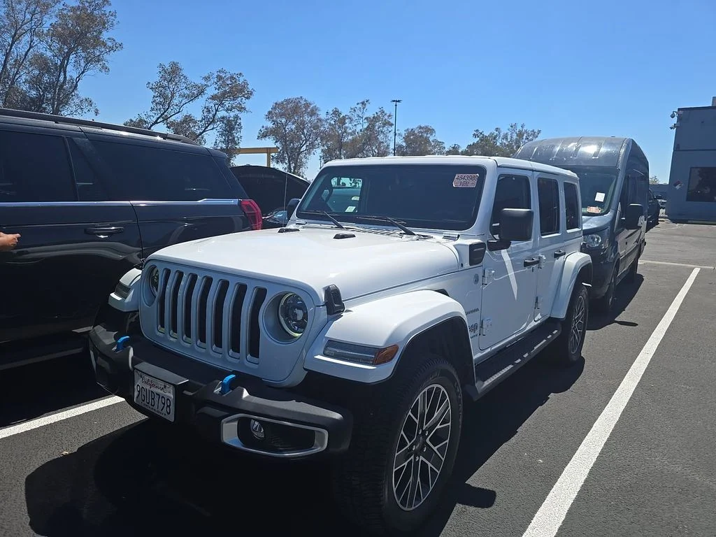 Used 2023 White Jeep Sahara 4xe image 1