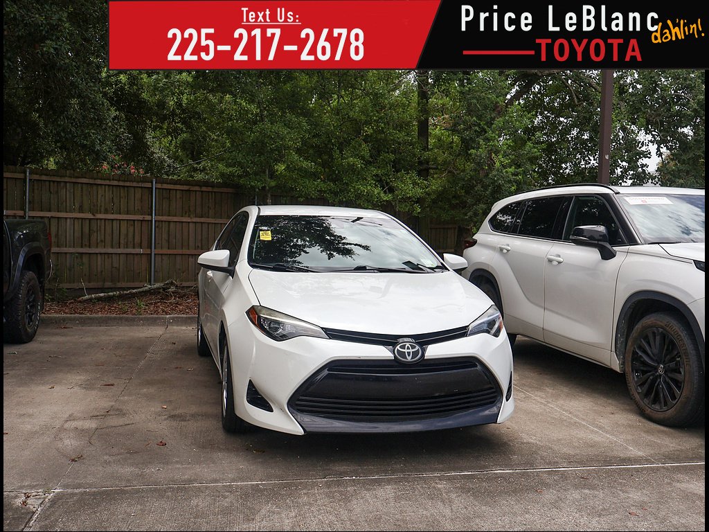 Used 2017 Super White Toyota LE image 1