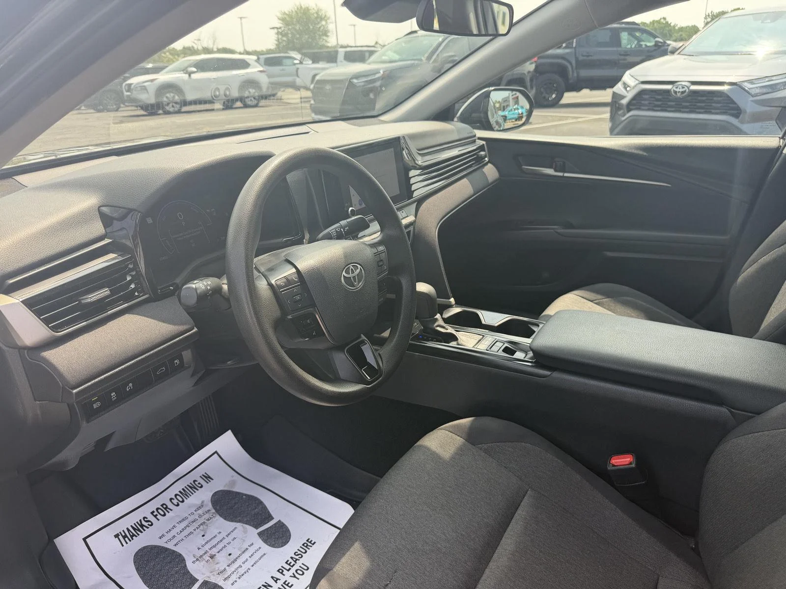Used 2025 Midnight Black Metallic Toyota LE image 13