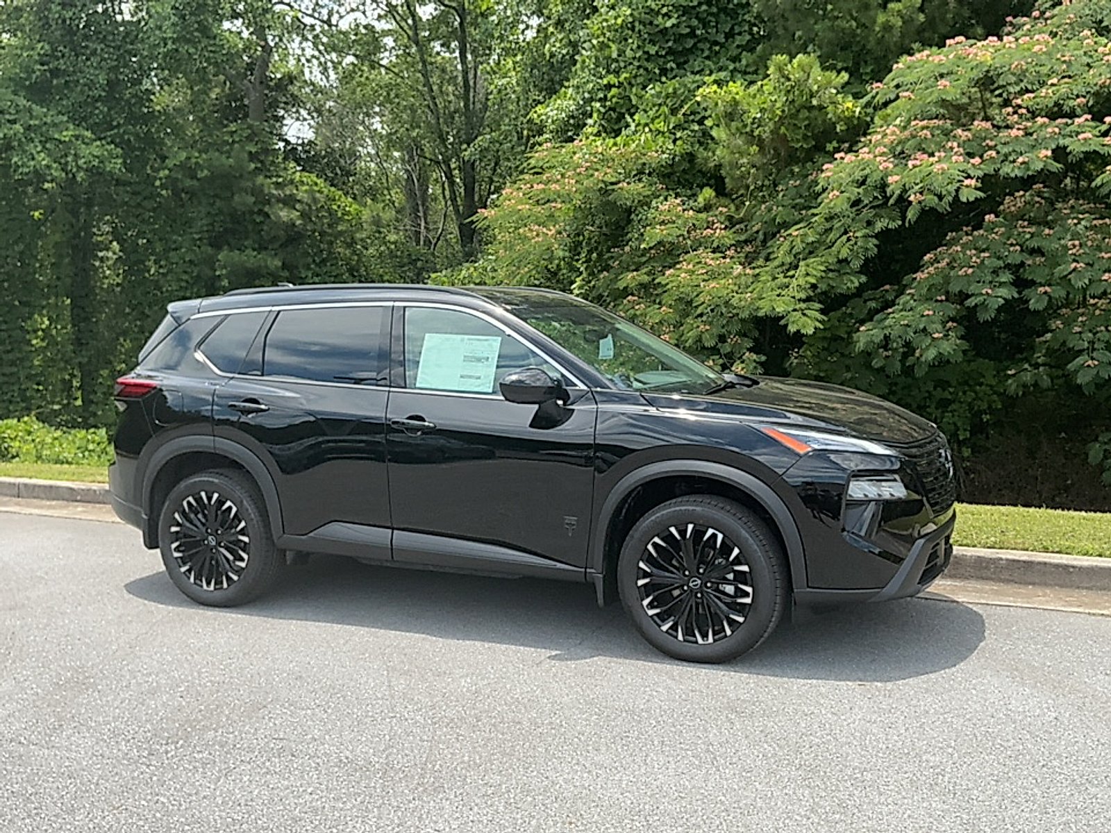 New 2026 Super Black Nissan Dark Armor image 1