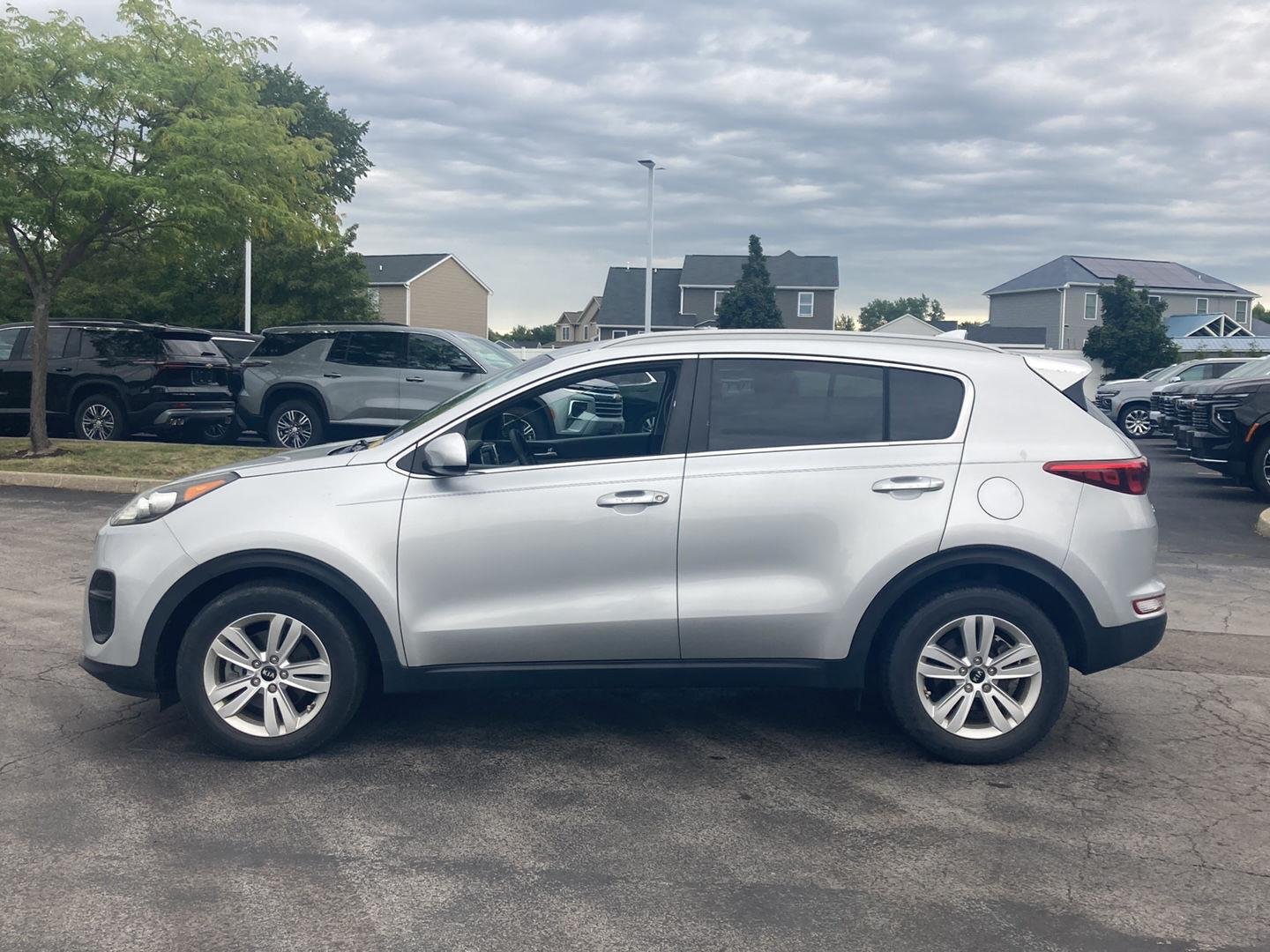 Used 2019 Sparkling Silver Kia LX image 4