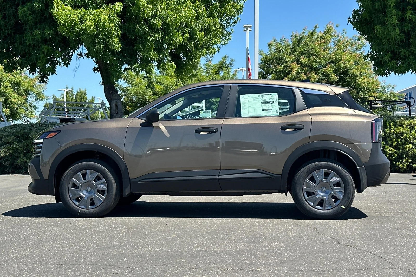 New 2026 Canyon Bronze Metallic Nissan S image 7
