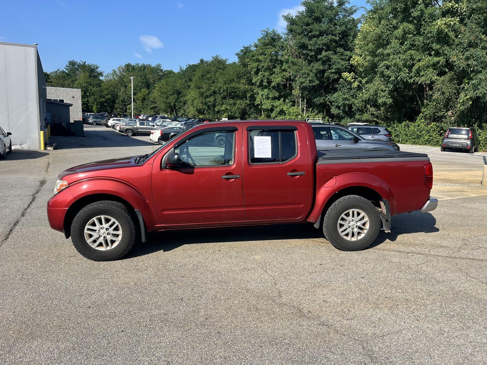Used 2016 Cayenne Red Nissan SV image 4