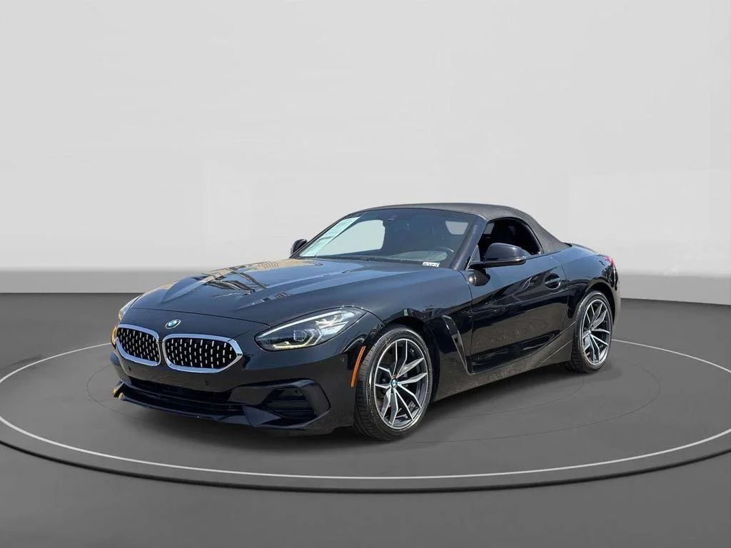 Used 2020 Black Sapphire Metallic BMW sDrive30i image 1