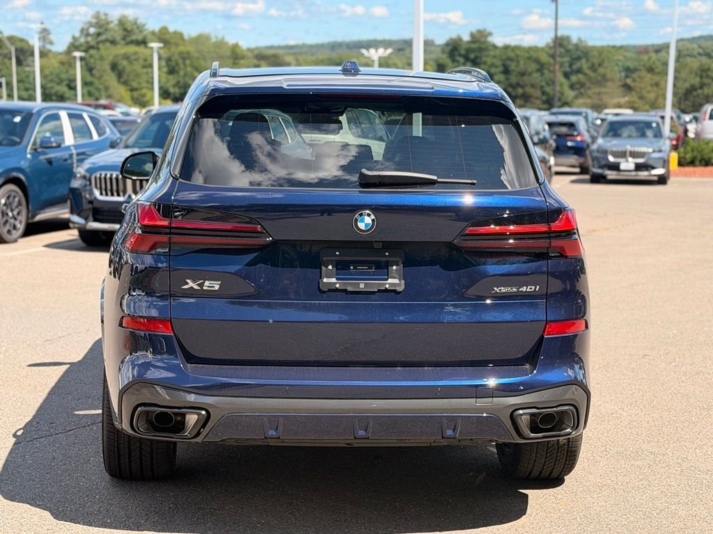 New 2026 Tanzanite Blue II Metallic BMW xDrive40i image 4
