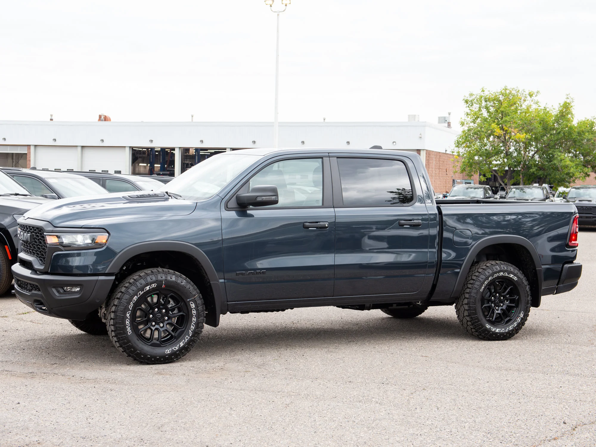 New 2026 Blue RAM Rebel* Crew Cab 4x4, 33 Inch A/T Tires, Heated Seats/Wheel, Nav, Locking Rear Diff image 5
