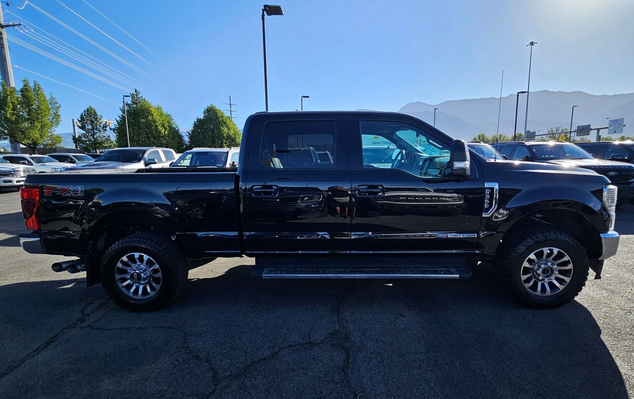 Used 2021 Black Metallic Ford LARIAT image 2