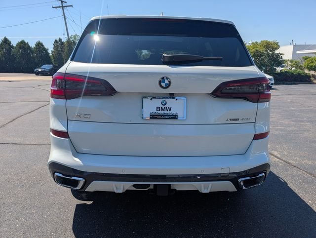 Used 2023 Mineral White Metallic BMW xDrive40i image 4