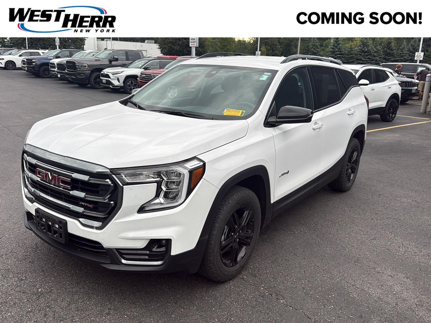 Used 2024 Summit White GMC AT4 image 1