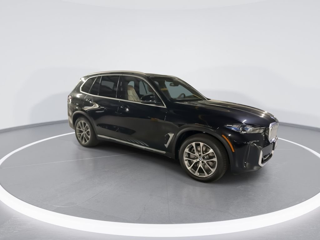New 2026 Black Sapphire Metallic BMW xDrive50e image 2