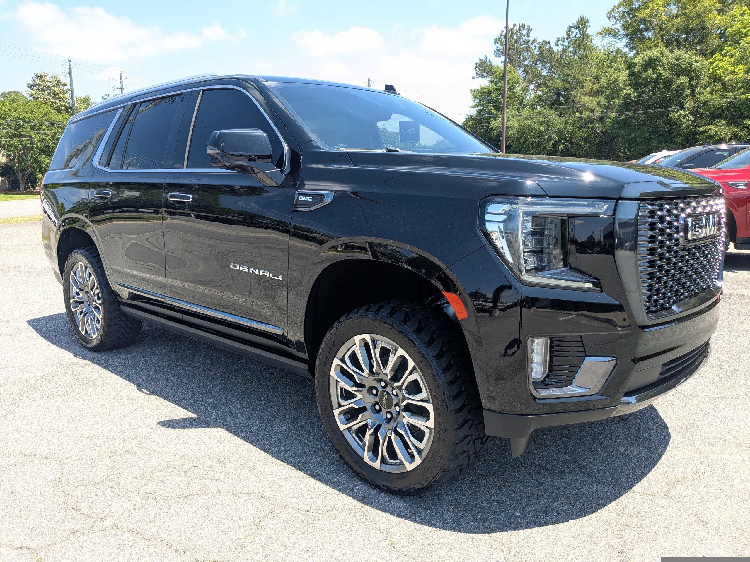 Used 2023 Onyx Black GMC Denali Ultimate image 1