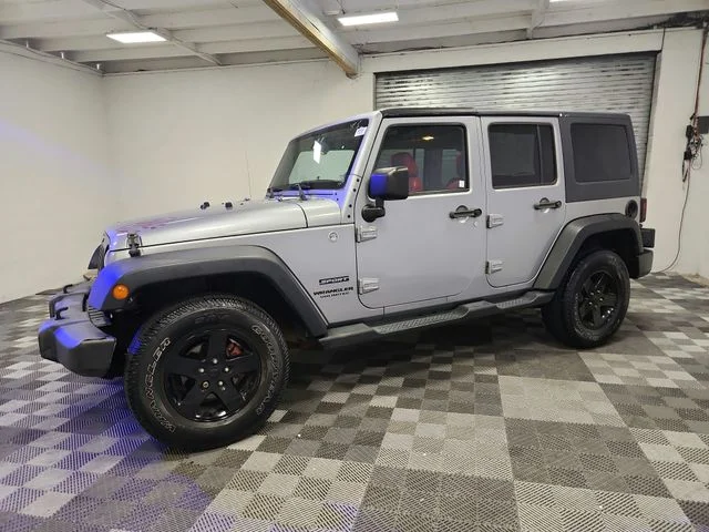 Used 2014 Gray Jeep Unlimited Sport image 4