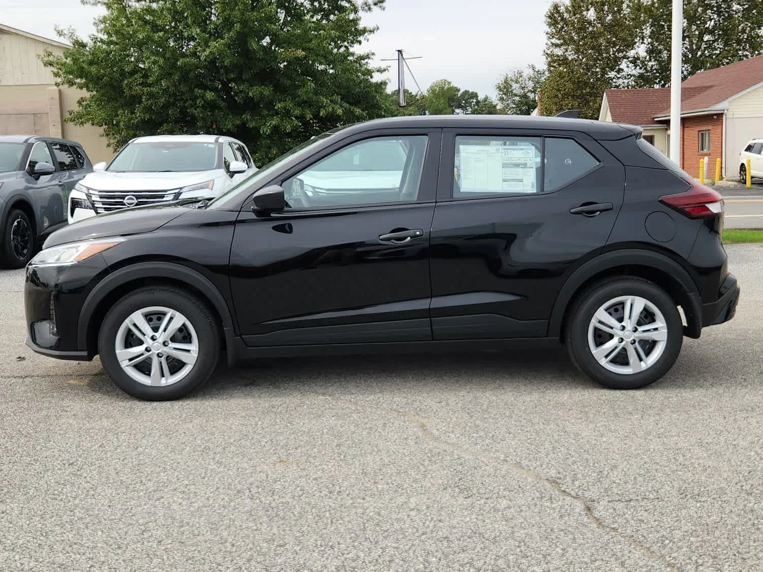 Certified Used 2025 Super Black Nissan S image 5